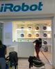 irobot-roomba-meuf-femme-de-menage-magasin-robot-balai-serpilliere