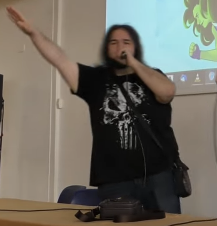 seb nazi jdg metal conference parler diapo cheveux bras punisher fermement