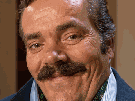 risitas-bg-costume-soiree-chad-seducteur-sourire-moqueur-gif